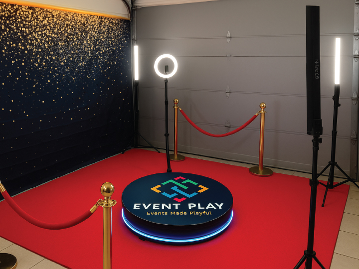 Affordable 360 photobooth setup in an event in Nairobi Kenya with branded platform, red carpet, and professional attendant.
