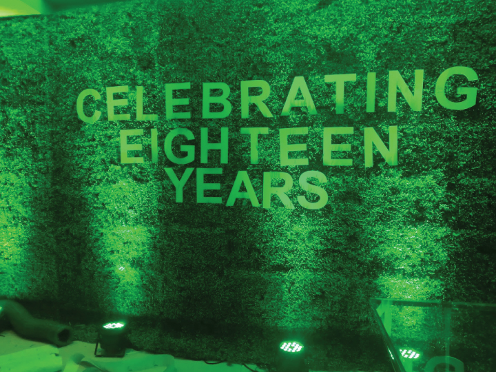 Artificial green and glass backdrop banner setup for events in Nairobi Kenya.