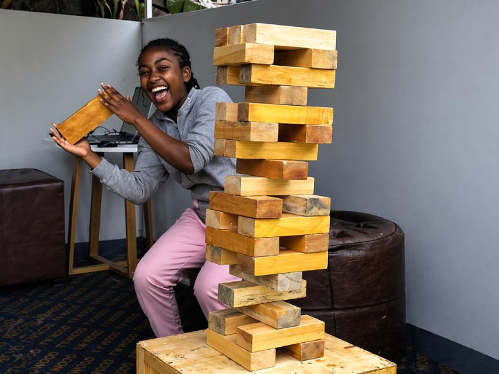 People enjoying a giant Jenga interactive game in Nairobi Kenya during an event setup by Eventplay